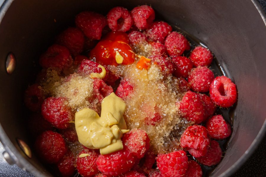 pot with raspberries, soy sauce, brown sugar and mustard