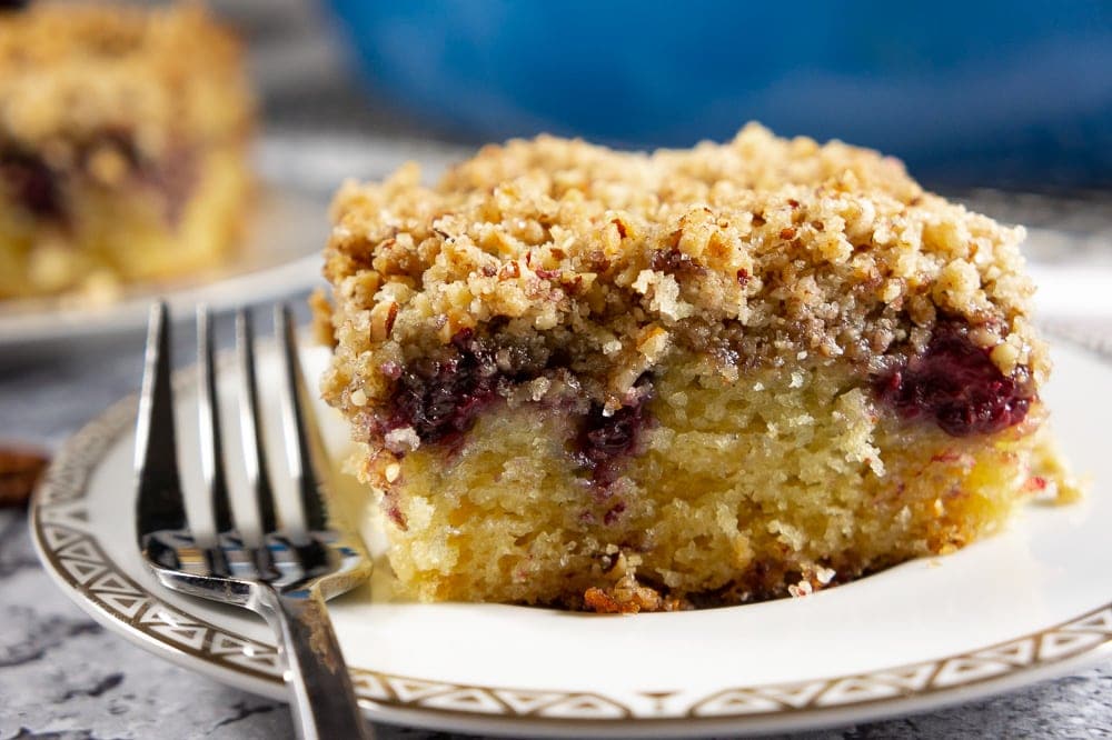 A slice of pecan blackberry coffee cake