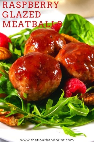 Close up green salad with beets and meatballs